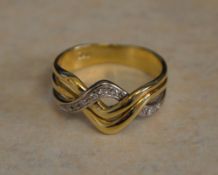 18ct gold diamond crossover ring, total approx weight 4.