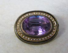 Tested as 15ct gold amethyst and seed pearl brooch D 3 cm