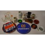 Breweriana including branded drinking glasses, Fosters tray, bar towels,