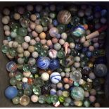 Tin of old marbles