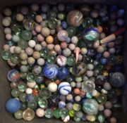 Tin of old marbles