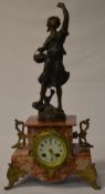A Japy Freres & Cie red & grey 8 day marble clock featuring female figural sculpture titled