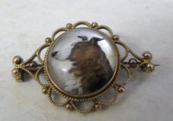 Tested as 9ct gold Victorian reverse intaglio brooch of a brown collie dog