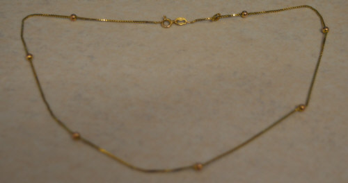 9ct gold chain decorated with evenly spaced small spheres, total approx weight 2.