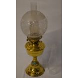 Brass oil lamp with spare chimney