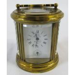 Small oval French brass carriage clock 'L'Epee Fondee en 1839 Sainte Suzanne France' H 8 cm (height