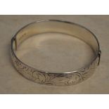 1970s silver bangle with an all over design, total approx weight 0.