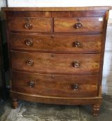 Victorian mahogany bow fronted chest of drawers with fluted canted corners & turned legs H 123 cm,