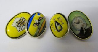 Set of silver and enamel cufflinks depicting cards, horse racing,