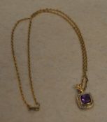 9ct gold amethyst and diamond chip pendant on a 9ct gold chain, total approx weight 4.