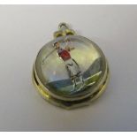 Silver reverse crystal intaglio pendant of a golfer marked 'sterling'