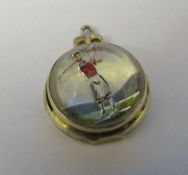 Silver reverse crystal intaglio pendant of a golfer marked 'sterling'