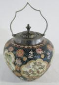 Oriental biscuit barrel with silver plate cover and swing handle
