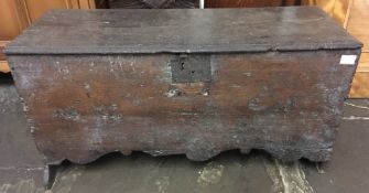 Early 17th century oak six plank chest with moulded apron L94cm W37cm H47cm