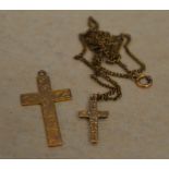 2 9ct gold crosses, one on a yellow metal chain,