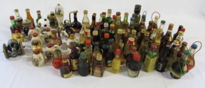 Selection of alcoholic miniatures inc ceramic and novelty bottles