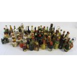 Selection of alcoholic miniatures inc ceramic and novelty bottles