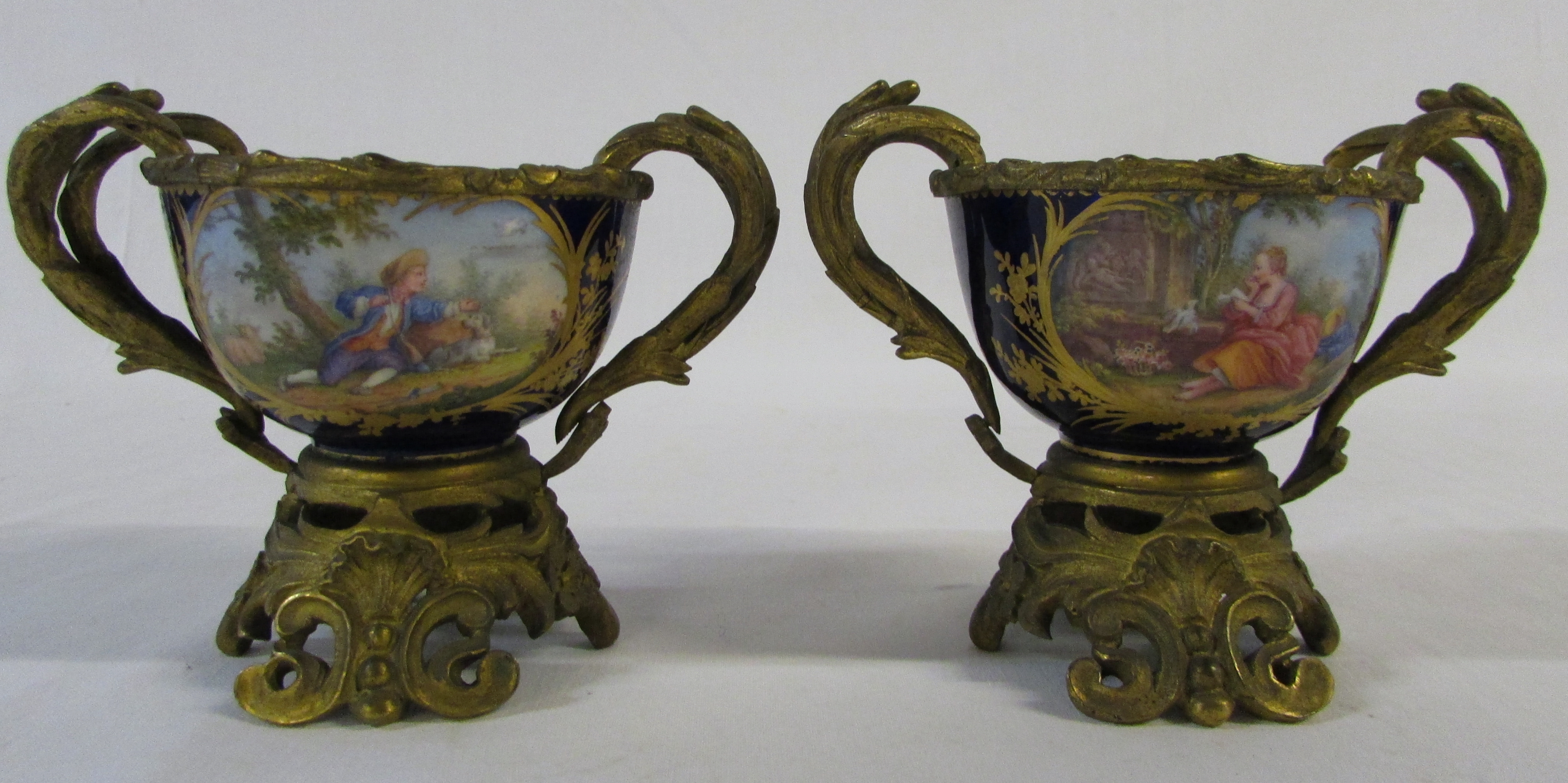 Pair of ormolu mounted Sevres porcelain vases H 9.
