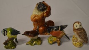 4 Beswick ceramic bird figures and a Beswick dog