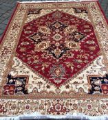 Red ground Heriz carpet 2.8m by 2.