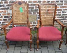 2 cane back chairs with red velvet seats
