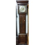 Georgian 30 hour longcase clock in an oak case with brass & silvered dial with secondary date dial