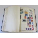 Stamp album containing GB and world stamps