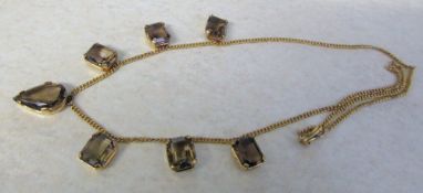 Tested as 9ct gold smokey quartz necklace total weight 22.