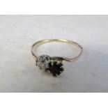 Tested as 15ct gold diamond and sapphire ring (diamond 0.