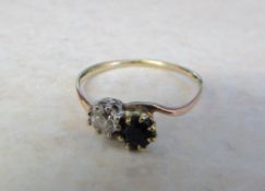 Tested as 15ct gold diamond and sapphire ring (diamond 0.