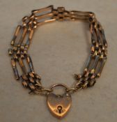 9ct gold gate bracelet with padlock, total approx weight 15.