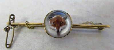 9ct gold reverse crystal intaglio brooch/stock pin of a fox mask