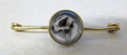 14ct gold reverse crystal intaglio brooch/stock pin depicting a small dog marked 'Tiffany & Co' in