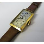 9ct gold ladies J W Benson London wristwatch with leather strap