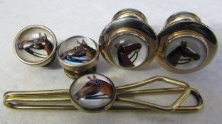 Gilt metal reverse crystal intaglio studs and tie clip of a horse etc