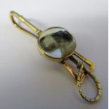 Tested as 14ct gold reverse crystal intaglio tie clip of a fox terrier dog with crop bar