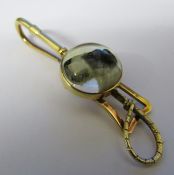 Tested as 14ct gold reverse crystal intaglio tie clip of a fox terrier dog with crop bar