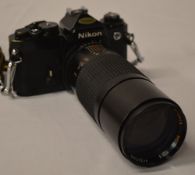 Nikon FE SLR Camera in black,