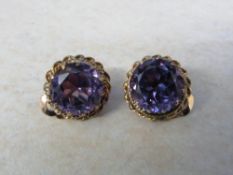 Tested as 14ct gold synthetic alexandrite clip on earrings total weight 8.