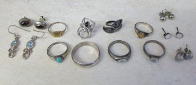 8 silver rings & 5 pairs of silver earrings
