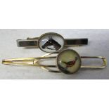 Gilt metal Stratton reverse crystal intaglio tie clip of a pheasant together with a horse tie clip
