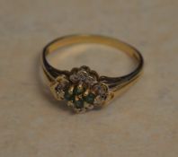 9ct gold emerald and diamond ring,