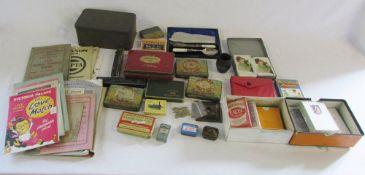 Selection of old tins, cigarette cards,