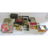 Selection of old tins, cigarette cards,