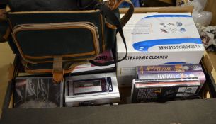 Ultrasonic cleaner, various DVDs, VHS-C camcorder,