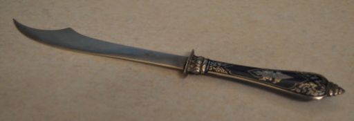 A Siam niello work handled paper knife with blade marked sterling