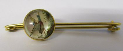 Tested as 15ct gold reverse crystal intaglio stock pin of a duck total weight 6.
