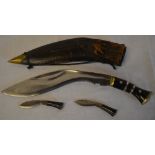Napalese Kukri with blade stamped 'Military Supply Syndicate' with scabbard and two miniature