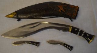 Napalese Kukri with blade stamped 'Military Supply Syndicate' with scabbard and two miniature