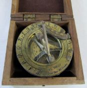 Cased nautical F L West brass compass sundial